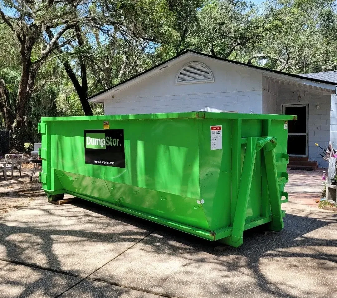 Residential dumpster rental on a Birmingham driveway